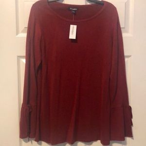 Sweater with flared sleeves